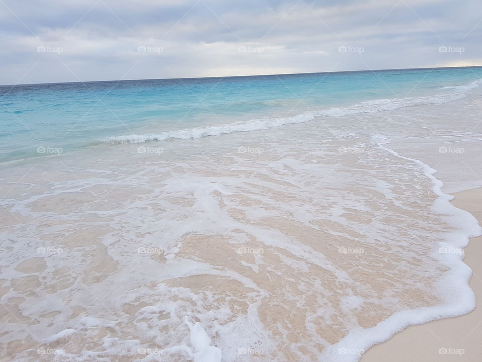 Elbow beach, Bermuda. Pink sand and clear, blue water.