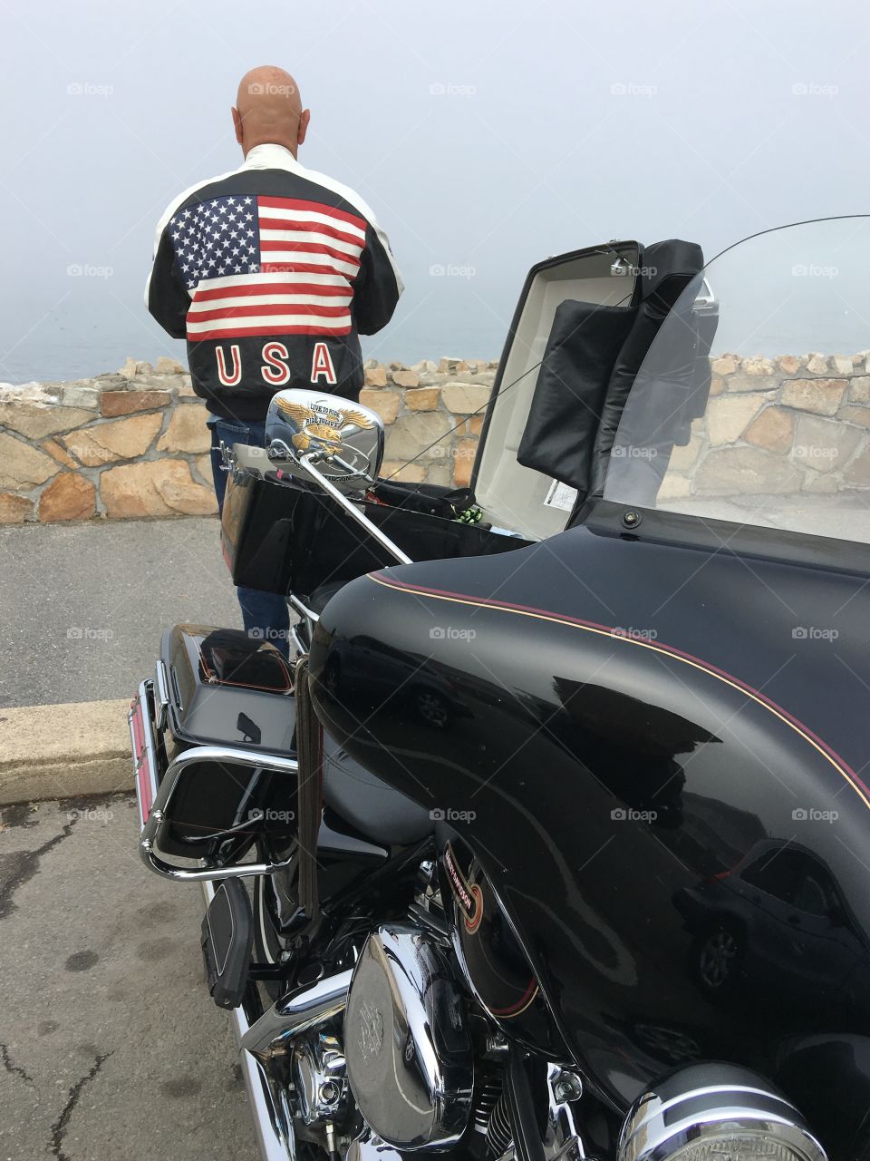 Standing with bike at Plymouth MA boardwalk, can't see water or The Mayflower Replica the Pilgrims used, through the fog.