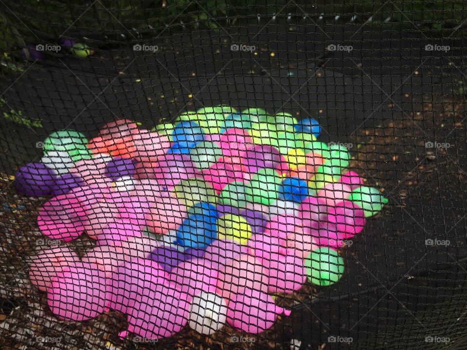 Water balloons on the trampoline 