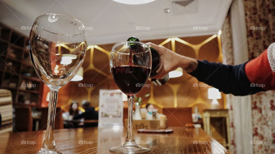 Pouring wine in a glass 