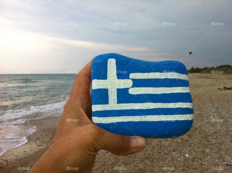 Greece flag on a stone