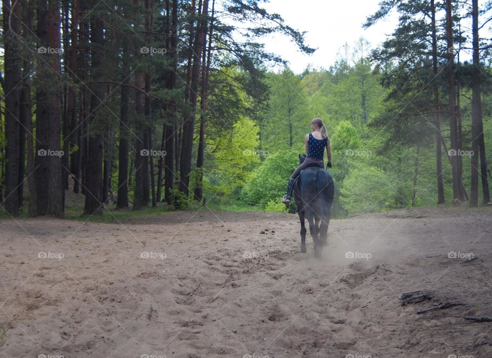 girl riding a horse