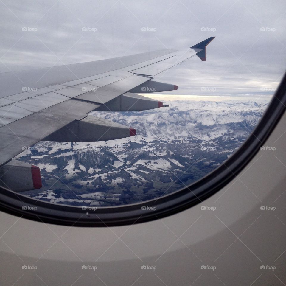 View from air plane flying above the Alps