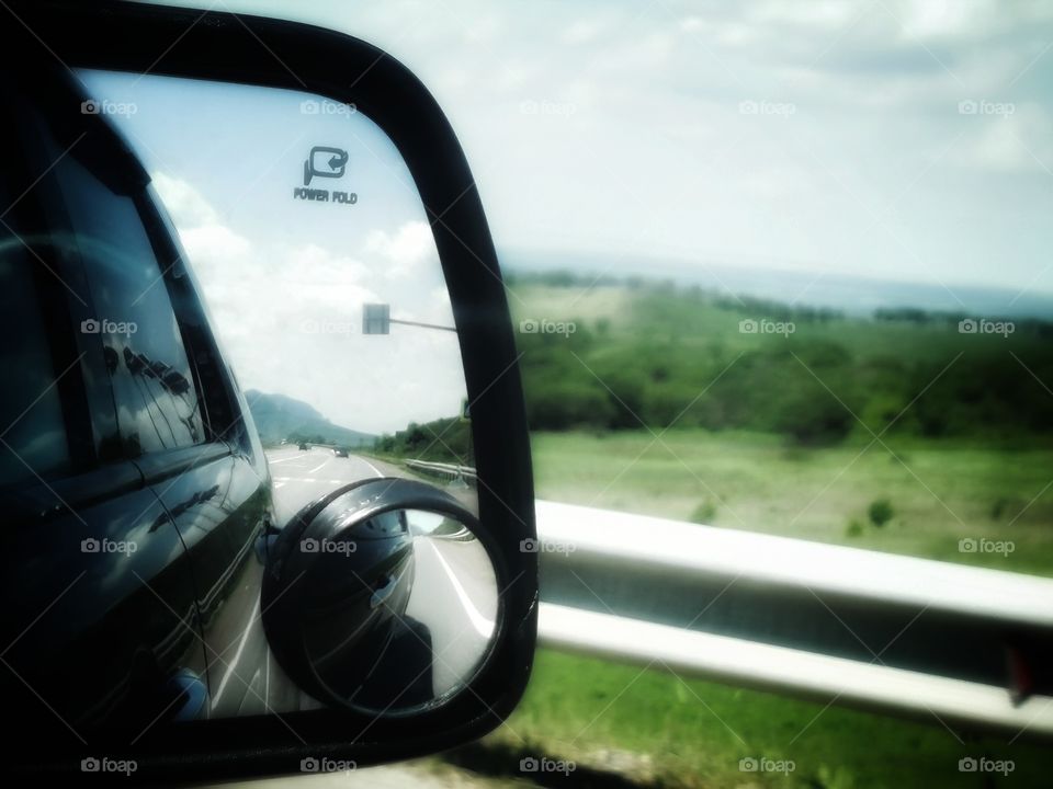 Travel trip way road view car mirror fog foggy milky mountains high freedom happy happiness view green plant grass field heaven moody sky skyline horizont blue street day outdoor outside joy