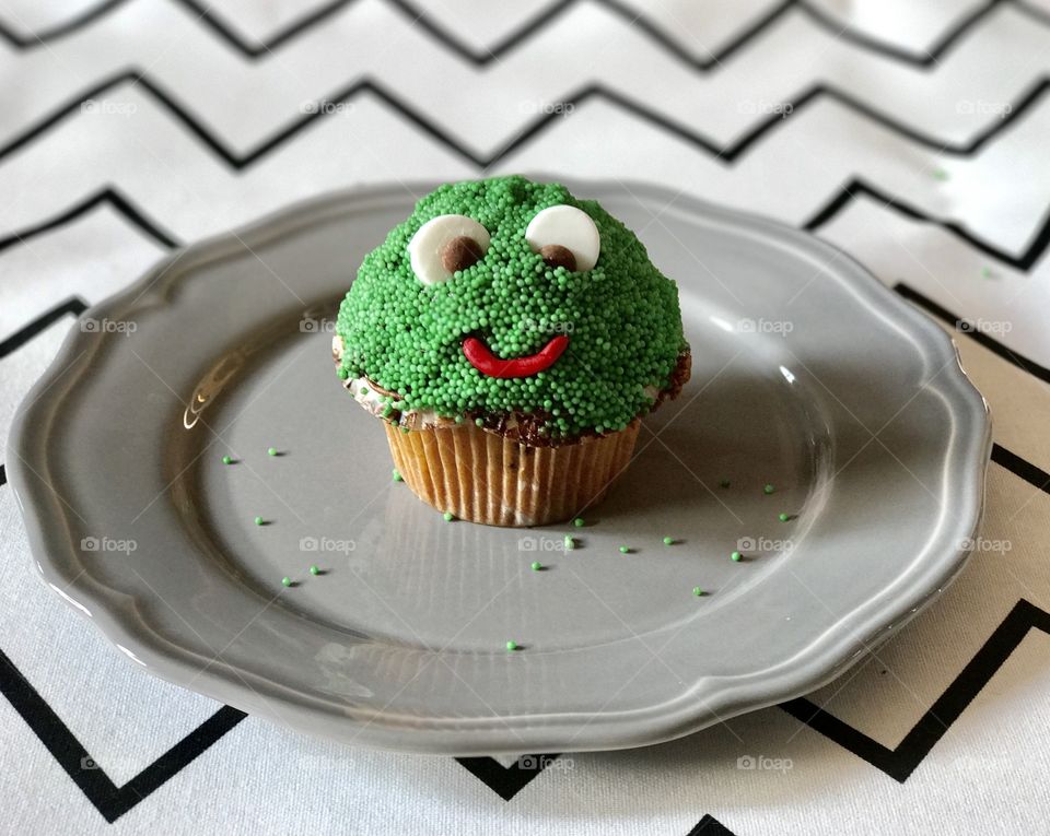 Anthropomorphic face on cupcake