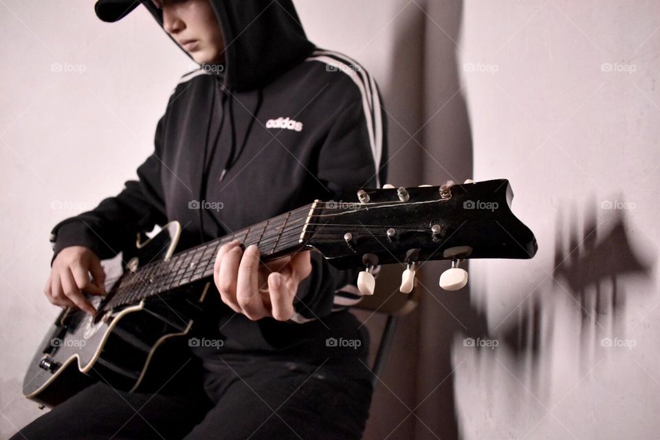 Playing guitar