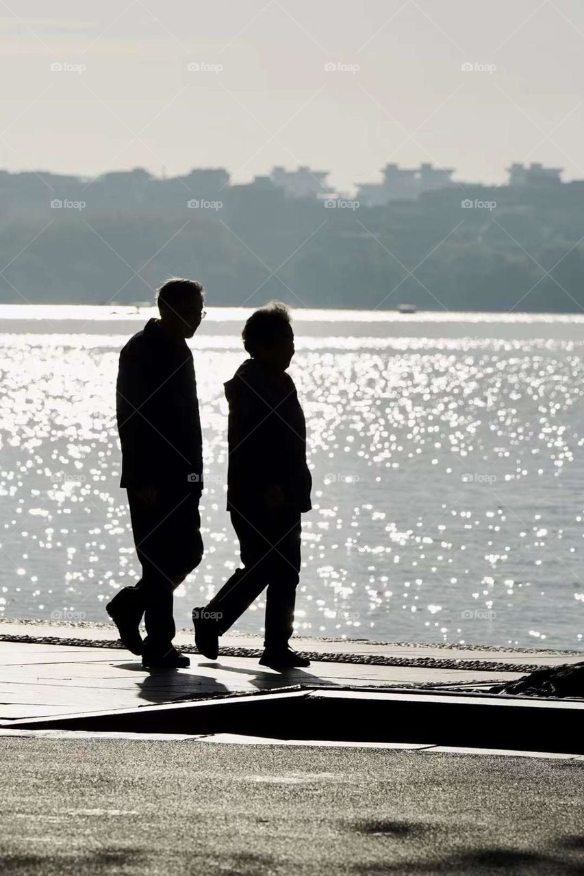 Old Couple Enjoying  Walk together 
