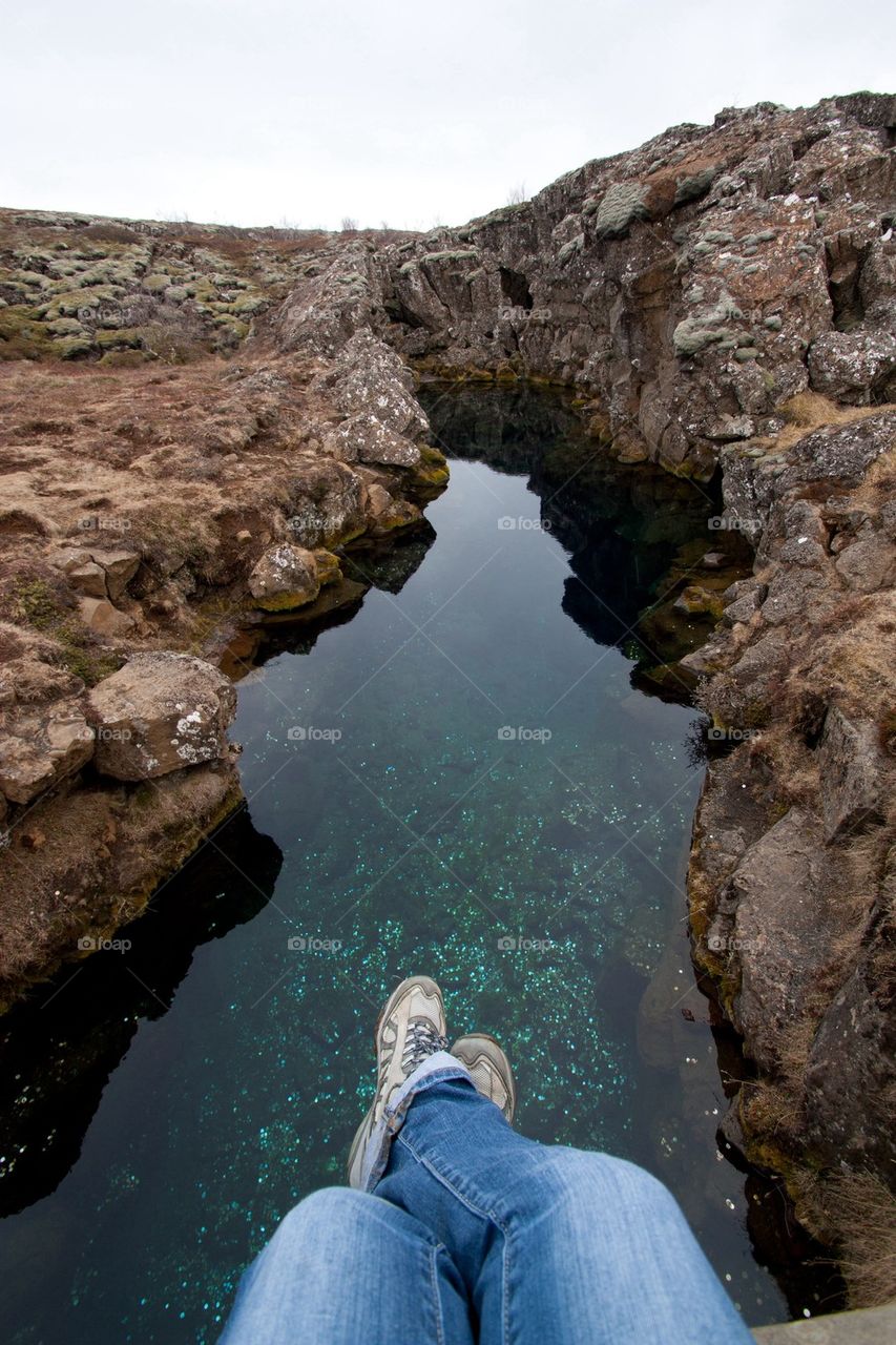 Low section of men on rock