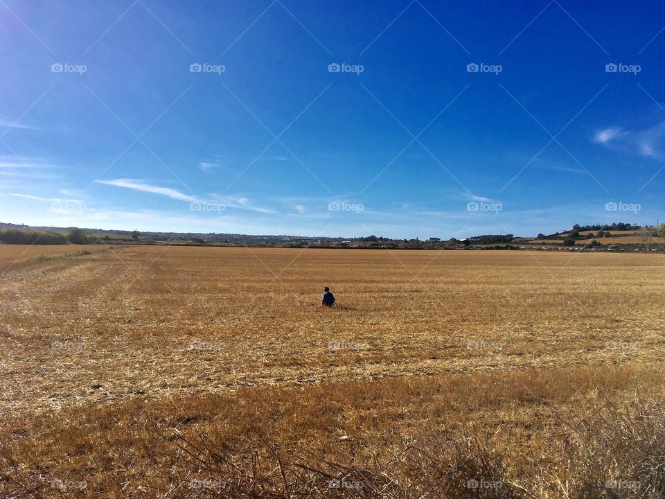 Child playing in the field 