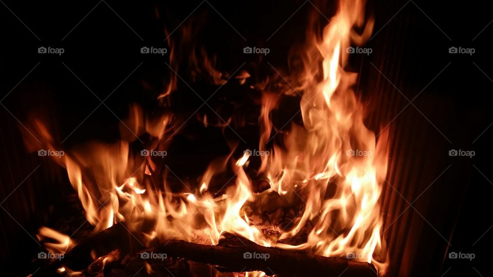 Burning logs in fireplace