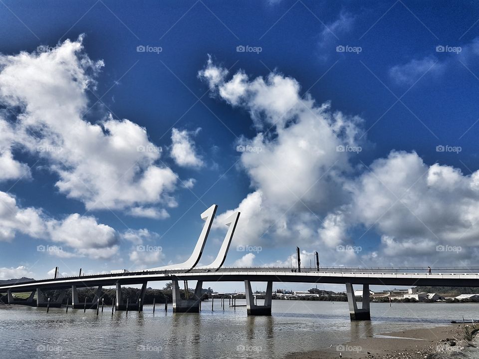 hook design Bridge over estuary on a beautiful day