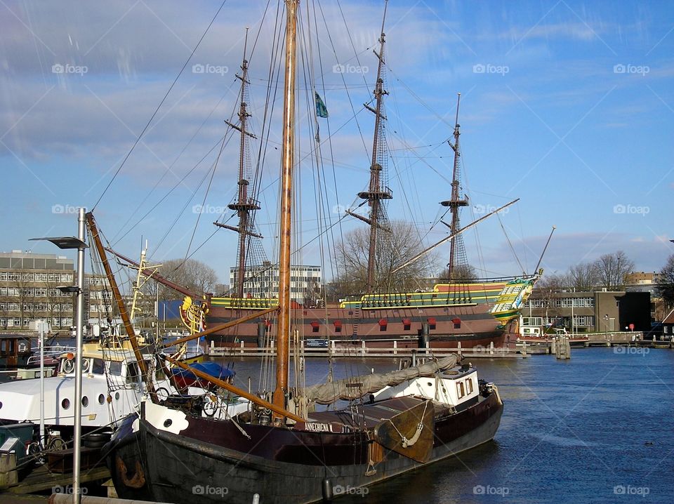 Old wooden sailboat in the harbor