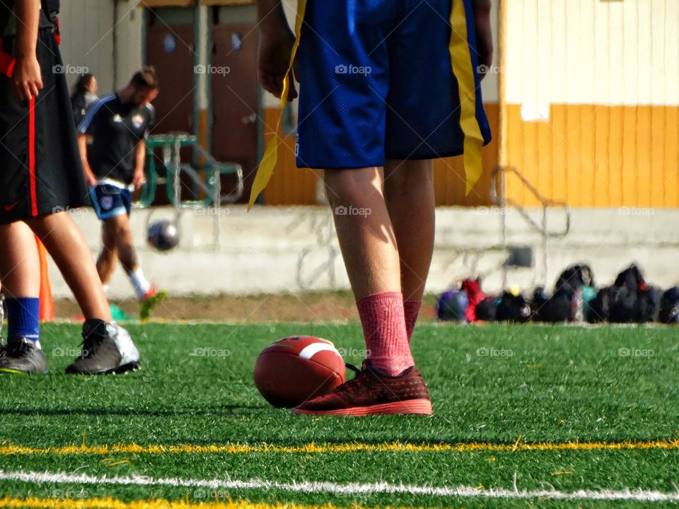 Kicking A Football
