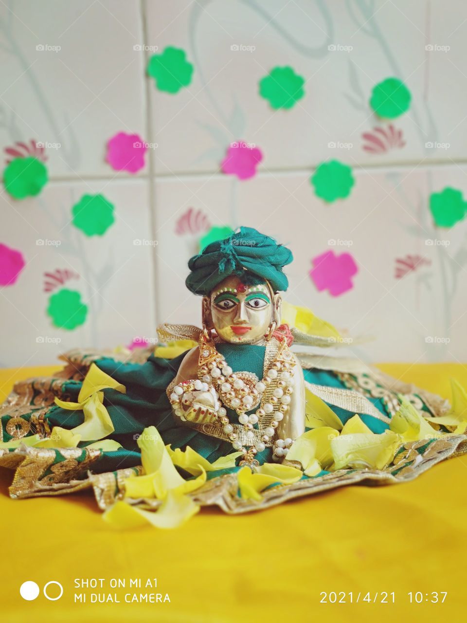 laddu gopal in green dress