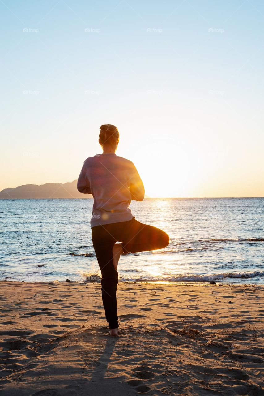 woman doing yoga