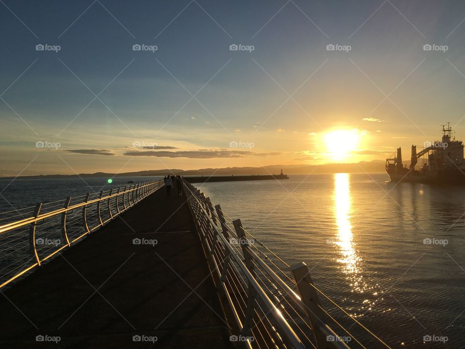 Breakwater on sunset