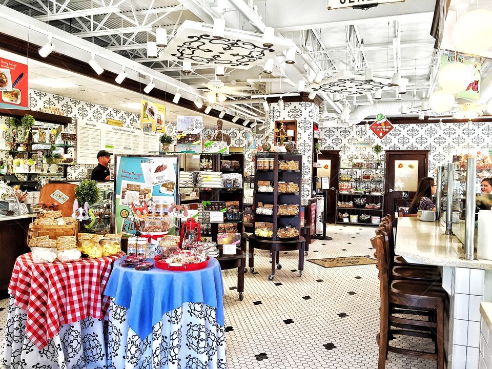 Old fashioned sweet shoppe. A sweet shop decorated in crisp black and white with pops of bright colors 