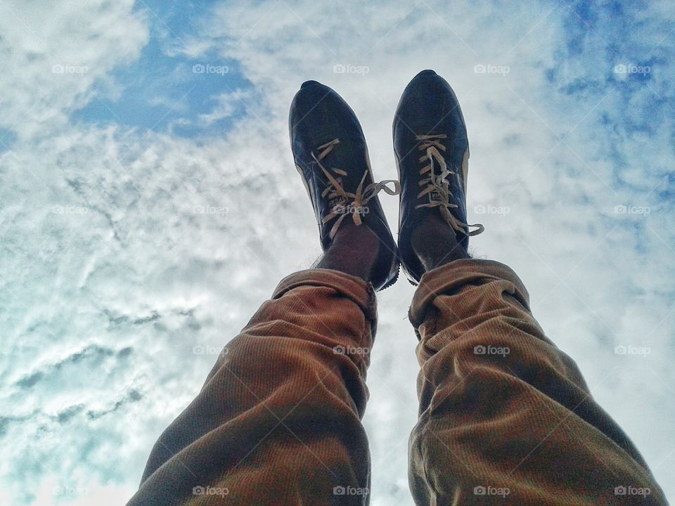Legs under the sky