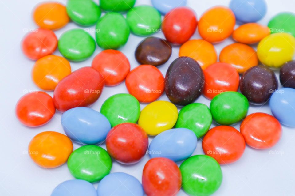 Colorful Tasty Candies in The White Background with  Detail Shot