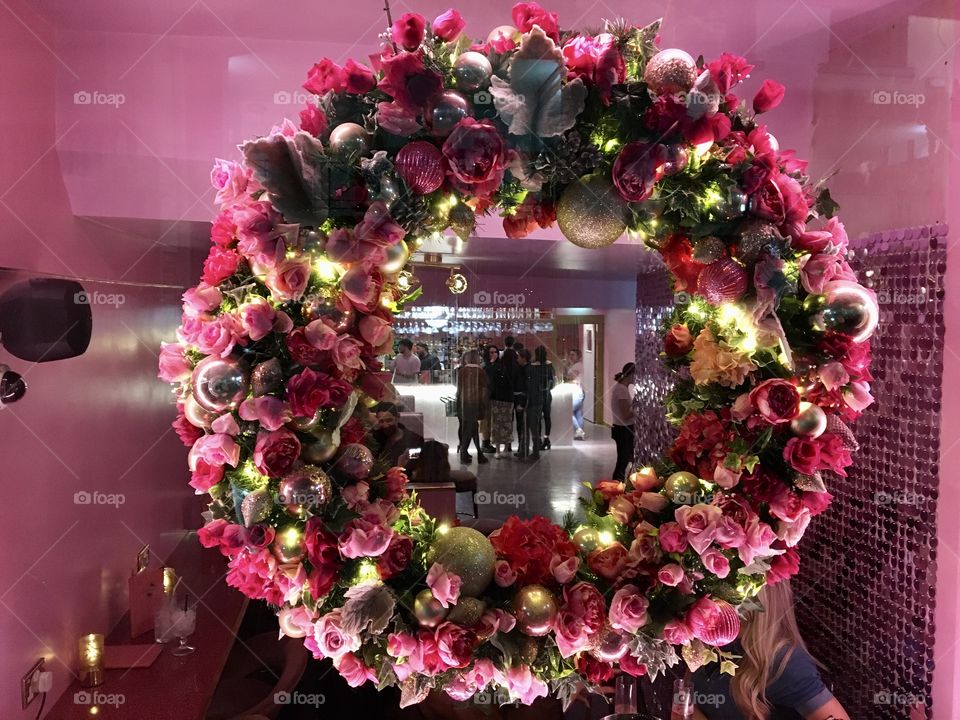 Floral Garland in a shop window ... pretty pink roses 