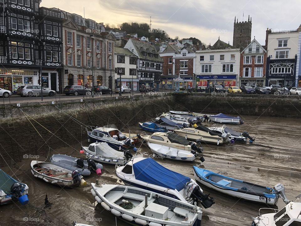 The enchanting harbor of Dartmouth in Devon at Christmas time 2018. The combination of independent shops in the background and a square harbor for its frontage works perfectly.