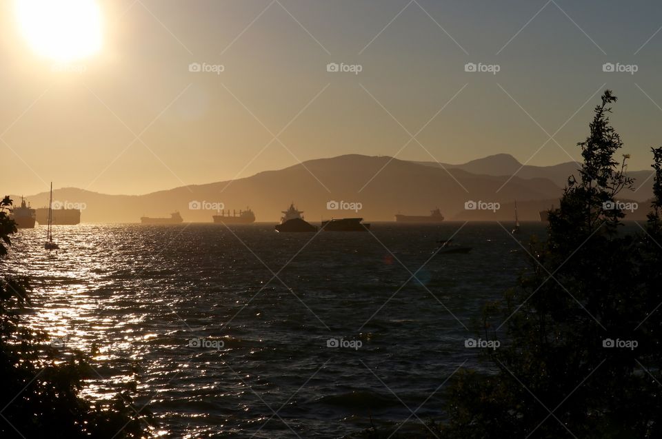 Vancouver British Columbia harbour at smokey sunset (forest fires throughout BC) creating the haze 