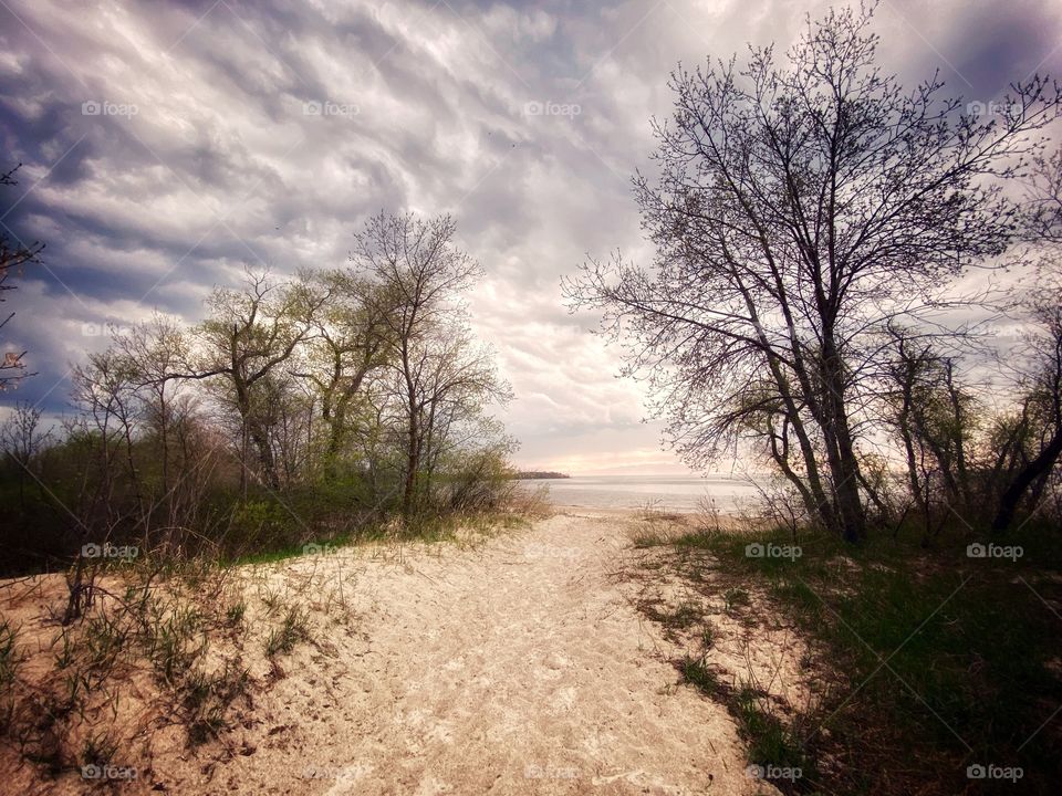 Storm rolling in on a lonely beach 