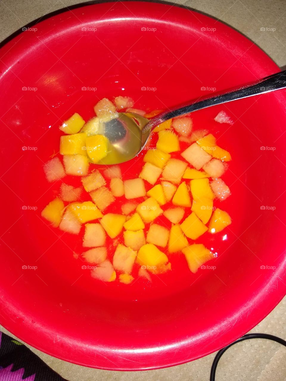 Peaches 🍑 and pears🍐in a red bowl 🥣. Canned fruit.