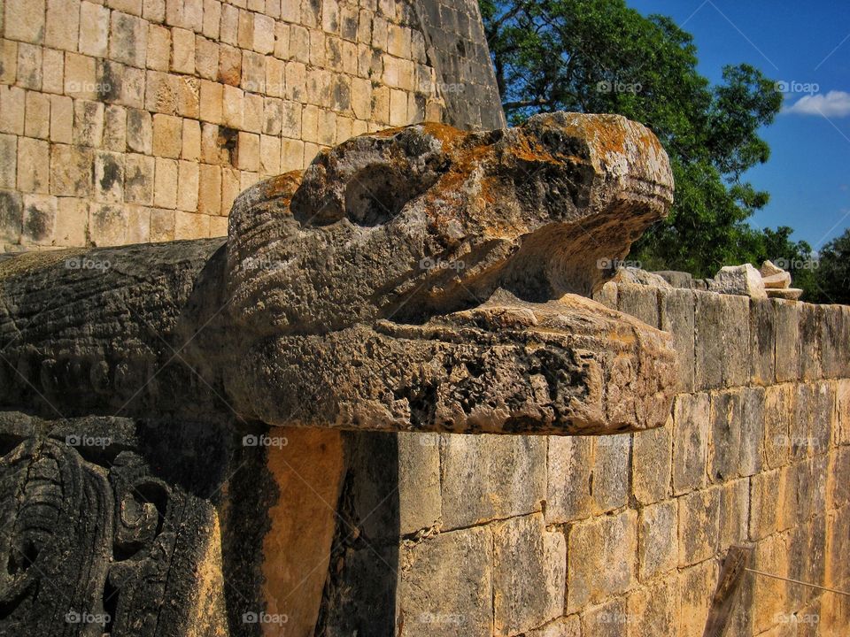 Statue of a Snake Head in Chichen Itza, Mexico