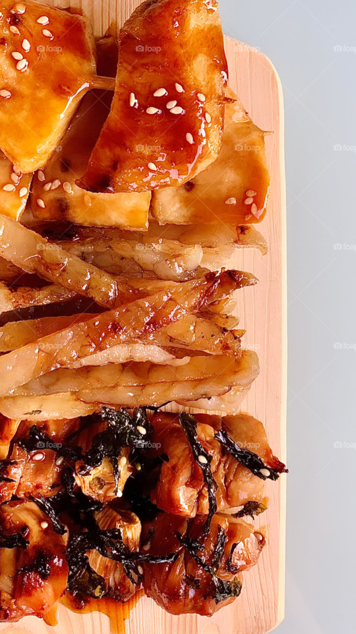 Japanese food delivery - grilled yaki tori sticks closeup