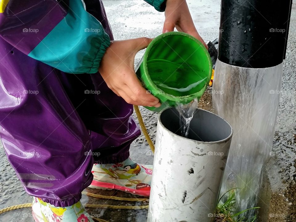 Playing with the rain water!