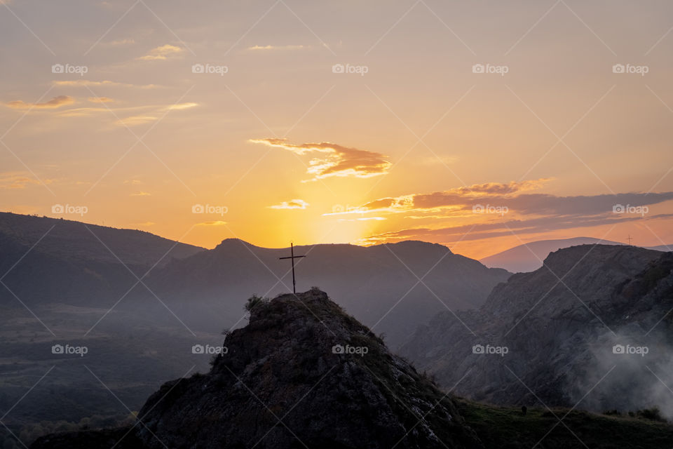 Sunrise over village in valley at Georgia countryside