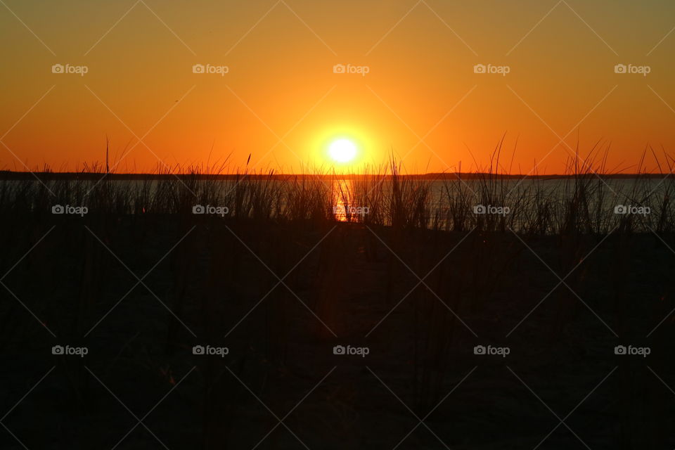 Fantastic sunset mood on the beach of Glowe on the island of Rügen in Germany in summer