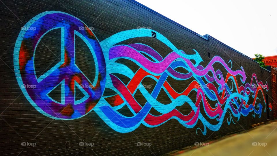 Urban art peace mural downtown Mckinney Texas USA