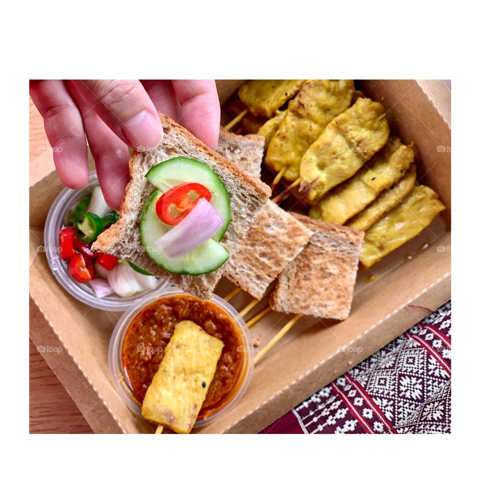 Homemade authentic Thai styled satay with peanut sauce and acar 