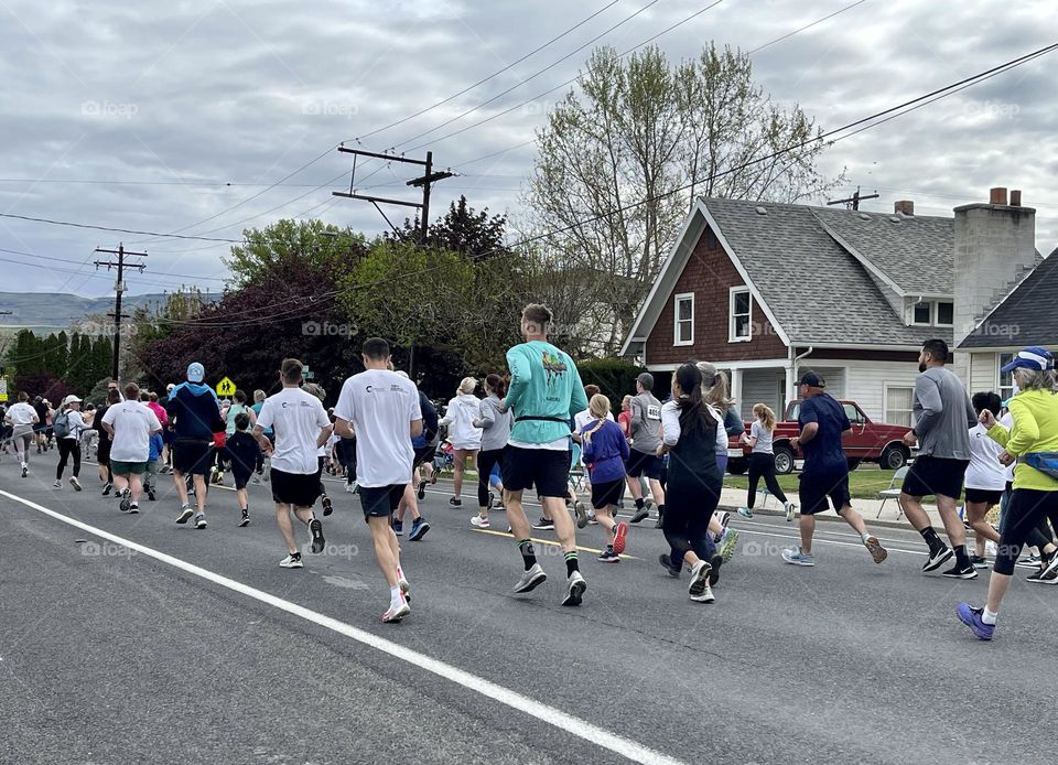 People running down the street 