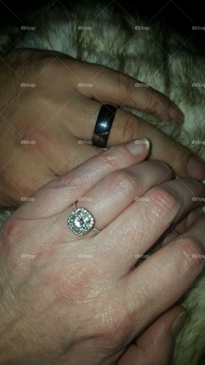 wedding rings on newlyweds