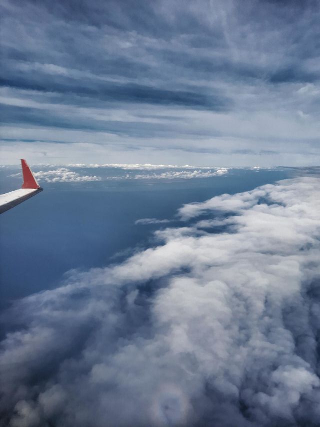 Flight over the sea and a wonderful panorama of clouds.