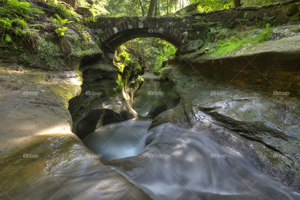Stone bridge over stream
