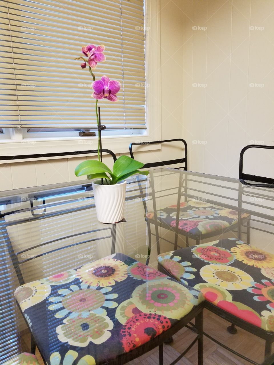 Flower on glass table