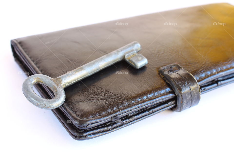 leather wallet and old key