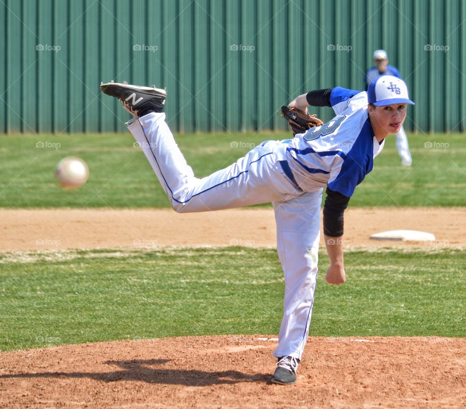 High school baseball pitcher. 