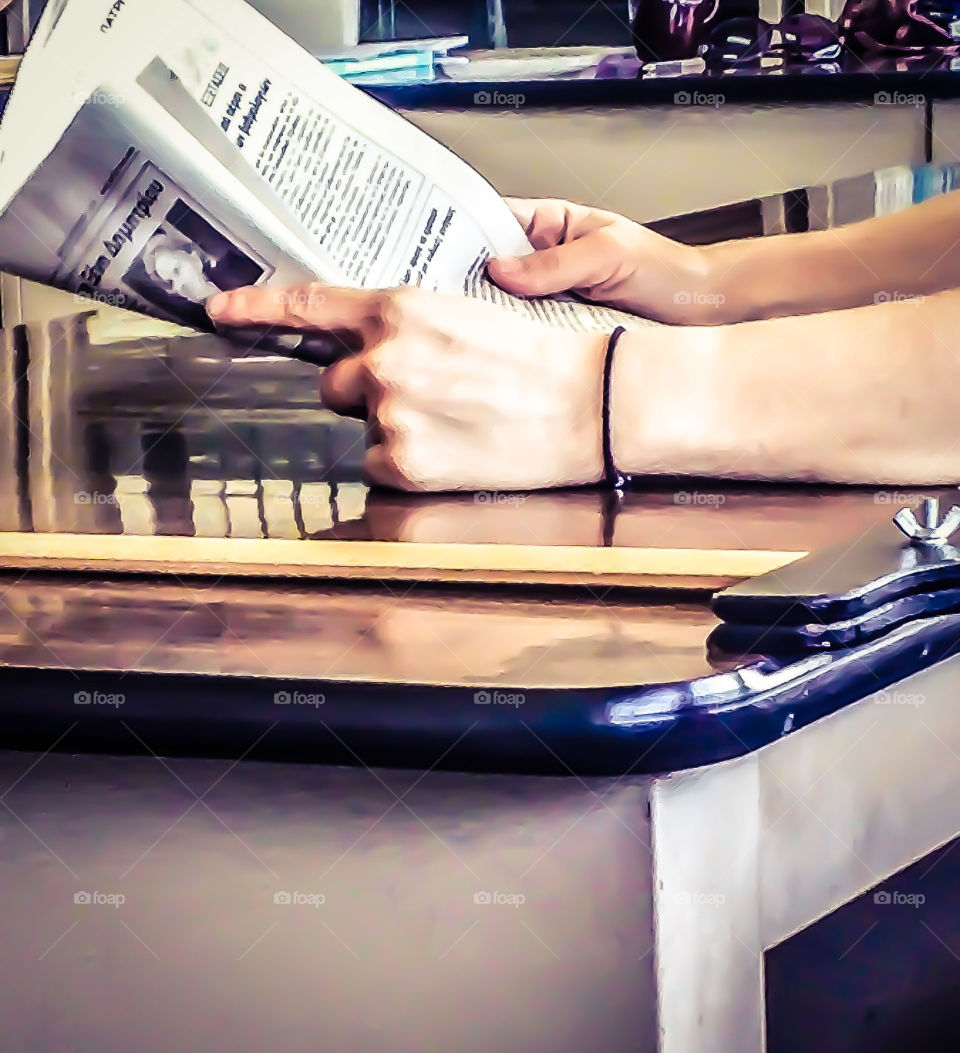 reading newspaper