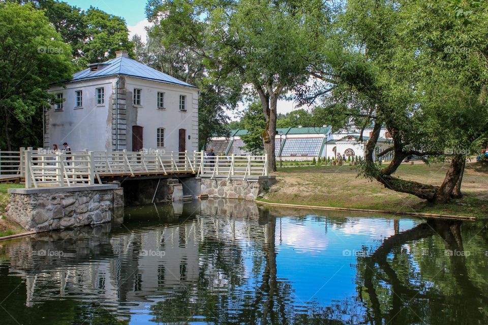 Outbuildings and a pond