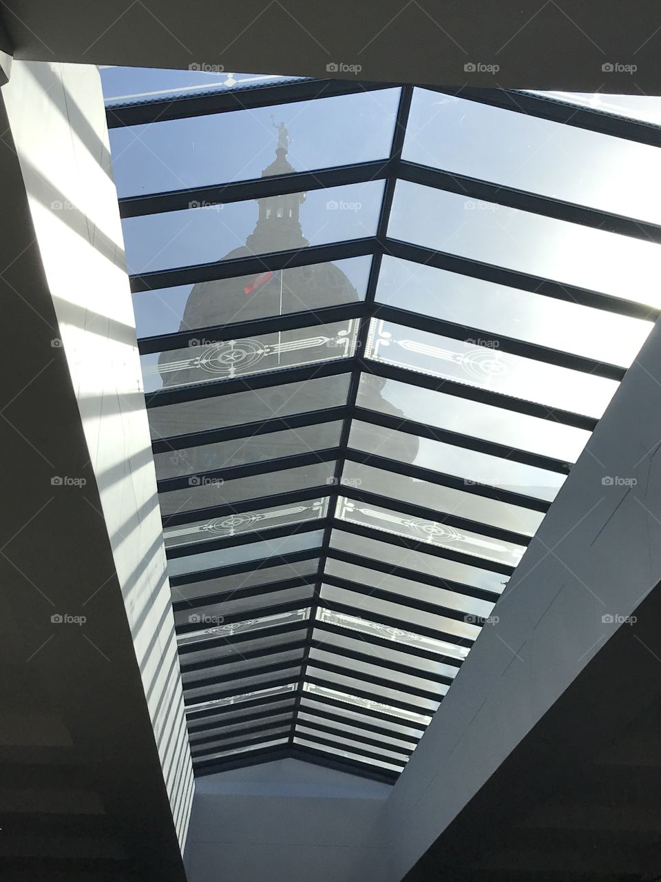 View of the Texas State Capital through a skylight window.
Austin, Texas circa January 2017