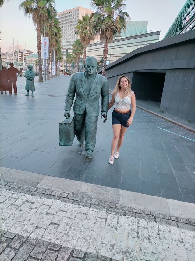 estátua de viajantes