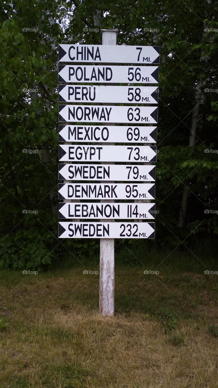 sign in Maine showing the various names of towns... see the typo?