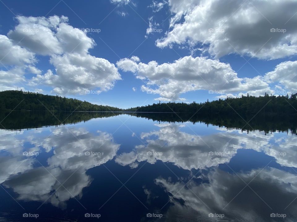 Mirror reflection on smooth lake