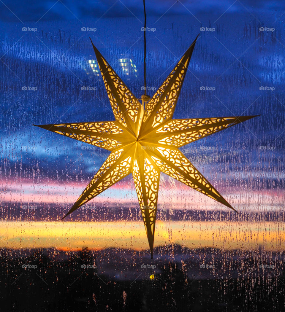 Christmas star in sunrise. 