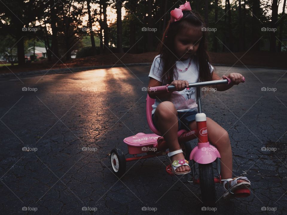 riding her trike